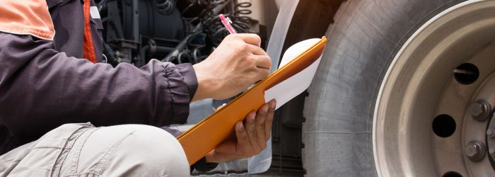 image of truck inspection in progress with clipboard